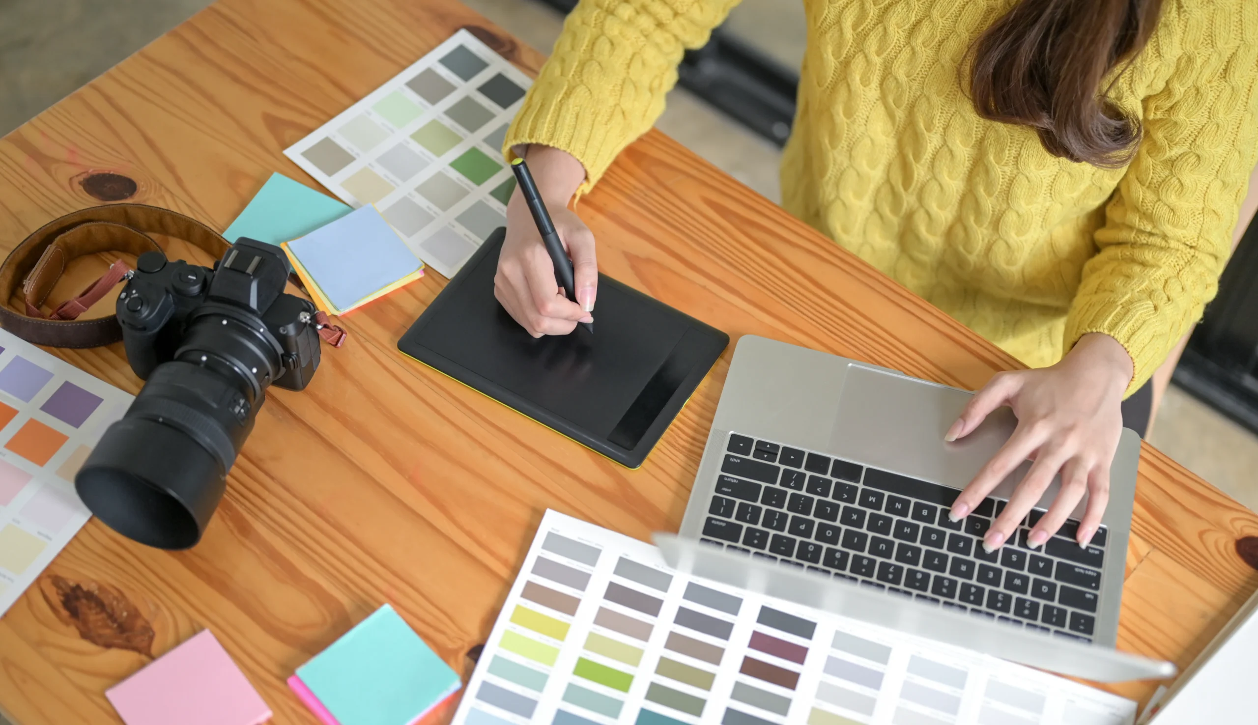 designers-are-working-on-a-drawing-tablet-and-lapt-2024-12-06-08-12-40-utc